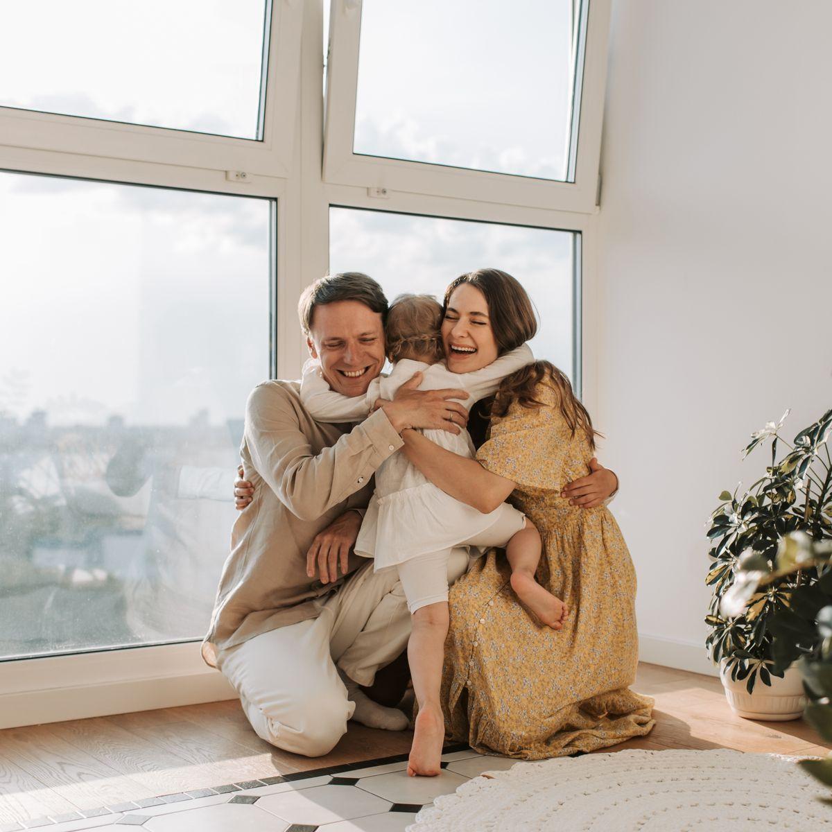 Professional and child engaged in warm, playful interaction